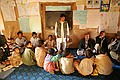 Afghani teacher and children